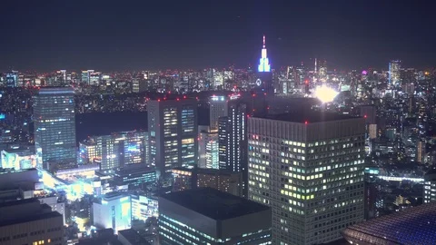 Time Lapse of Central Tokyo At Night with Yoyogi Building and Flashing Red Stock Footage 98228177
