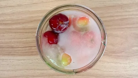 Time lapse of changes in frozen Barbados cherries Stock Footage 289397785
