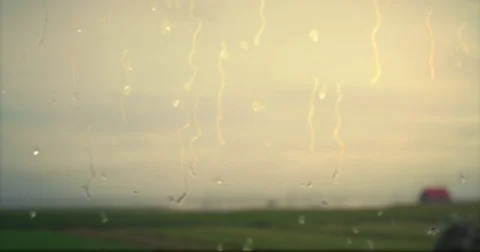 Time lapse of changing weather with raindrops, clouds, sailingboats and horses Stock Footage 72511242