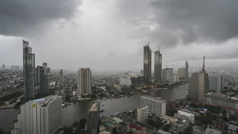 Time lapse of Chao Phraya river and Bangkok skyline on rainy day Stock Footage 229690023