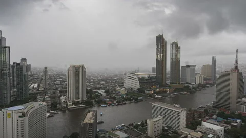 Time lapse of Chao Phraya river and Bangkok skyline on rainy day Stock Footage 229690056