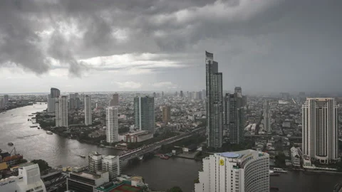 Time lapse of Chao Phraya river and Bangkok skyline on rainy day Stock Footage 229690547