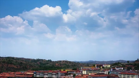 Time-lapse of Chinese town and rural landscape, blue sky and rolling clouds Stock Footage 152113191