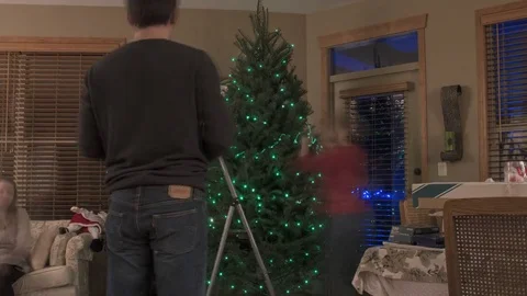 Time Lapse of Christmas Tree Being Decorated in 4K Stock-Footage 71220917