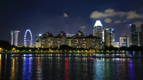 Time lapse city night view Singapore flyer and Marina Bay Stock Footage 52981813