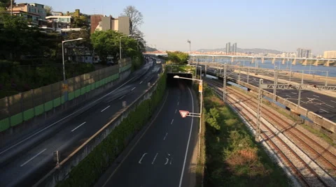 Time lapse of city traffic on freeway at sunset Video stock 62586549
