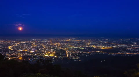 Time Lapse Cityscape and Full Moon Moving Over Downtown Of Chiang Mai, Thailand Stock Footage 57232321