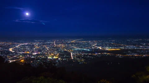 Time Lapse Cityscape and Full Moon Moving Over Downtown Of Chiang Mai, Thailand Stock Footage 57232506