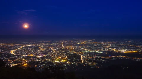 Time Lapse Cityscape and Full Moon Moving Over Downtown Of Chiang Mai, Thailand Stock Footage 57232621