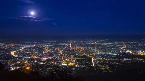 Time Lapse Cityscape and Full Moon Moving Over Downtown Of Chiang Mai, Thailand Stock Footage 57232705