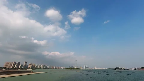Time lapse cityscape at daytime blue sky, white clouds pass over the IFS Stock-Footage 148478708