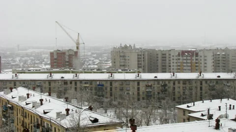 Time lapse of cityscape with falling snow Видео 921475