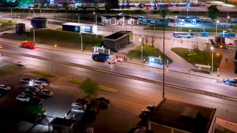 Time lapse. Cleaning up construction waste after night road work Stock Footage 258848035