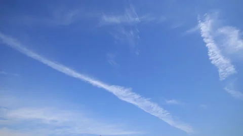 Time lapse of clear blue sky and clouds running billowing. 4k 4096x2304 clip. Stock Footage 44444967