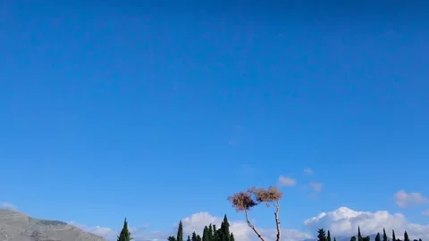 Time Lapse of a Clear Sky with Mountains in the Background in Calabria Stock Footage 254021363