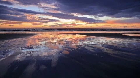 Time lapse clip. Moving sunset clouds on the north coast of Iceland's Snafell Stock Footage 67096725