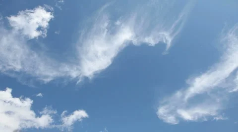 Time lapse clip of white clouds over blue sky Stock Footage 948879