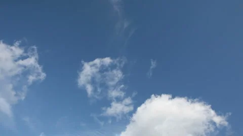 Time lapse clip of white clouds over blue sky Stock Footage 948942