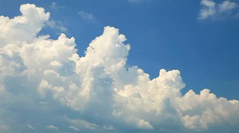 Time lapse clip of white clouds over blue sky Video stock 10809513