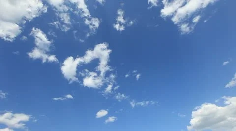 Time lapse clip of white clouds over blue sky Stock Footage 10809622