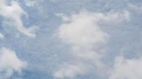 Time lapse clip of white fluffy clouds over blue sky Video stock 43044985