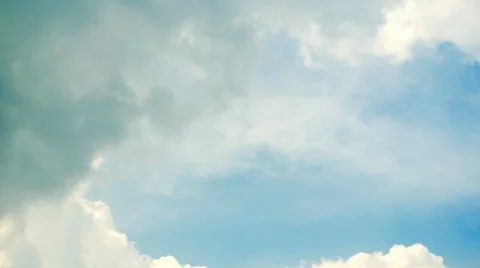 Time lapse clip of white fluffy clouds over blue sky Video stock 43188949