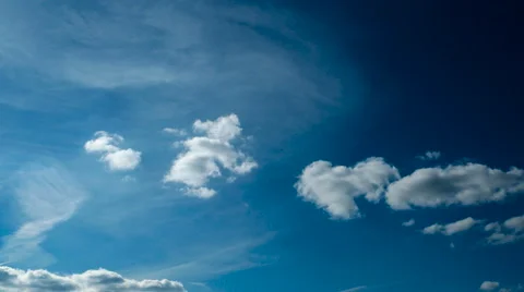 Time lapse clip of white fluffy clouds over blue sky. Beautiful cloudscape Stock Footage 63297572