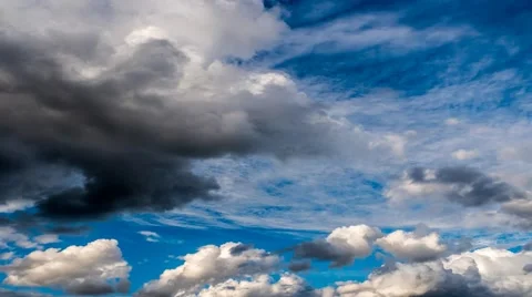 Time lapse clip of white fluffy clouds over blue sky Video stock 65069791
