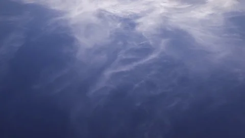 Time lapse clip of white fluffy clouds over blue sky Stock Footage 76513951