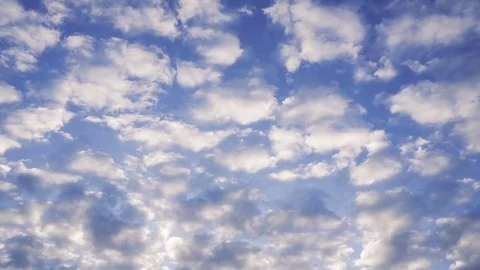 Time lapse clip of white fluffy clouds over blue sky Stock Footage 83090239