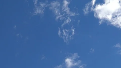 Time lapse clip of white fluffy clouds over sky Stock Footage 95796463