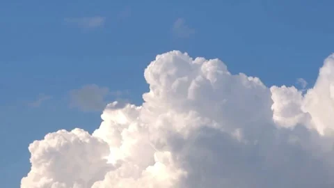 Time Lapse Clip Of White Fluffy Clouds Over Blue Sky Stock Footage 248170134