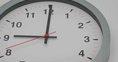 Time-lapse clock with black arrows shows time 9.00 speed up and slow to 10.00 Stock Footage 120941596