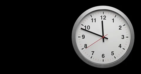 Time-lapse clock with black arrows shows time 11.40 speed up and slow to 12.00 Stock Footage 121376763