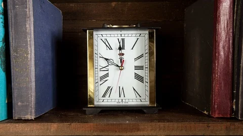Time lapse clock - camera rotates with big hand of a clock from 10:00-11:00 Stock Footage 94774026