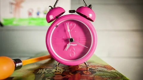 Time lapse clock - camera rotates with big hand of a clock from 07:00-08:00 Stock Footage 94775094