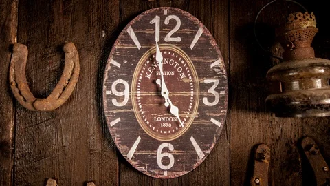 Time lapse clock - camera rotates with big hand of a clock from 05:00-06:00 Stock Footage 94779286