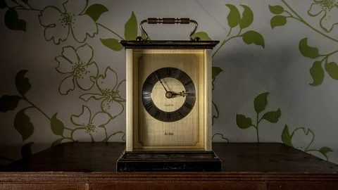 Time lapse clock - camera rotates with big hand of a clock from 03:00-04:00 Stock Footage 94780582