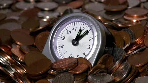 Time lapse of Clock embedded in money Video stock 12187446