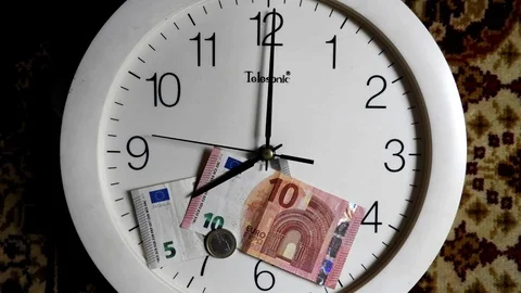 Time lapse Clock with money 1 Time is money Stock Footage 111219896