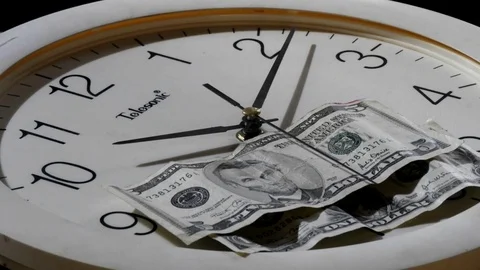 Time lapse Clock with money 2 Time is money Video stock 111219930