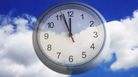 Time lapse of a clock over clouds Stock Footage 49270515
