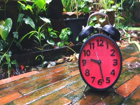 Time lapse of a Clock speeding up on rainy day Stock Footage 76455136