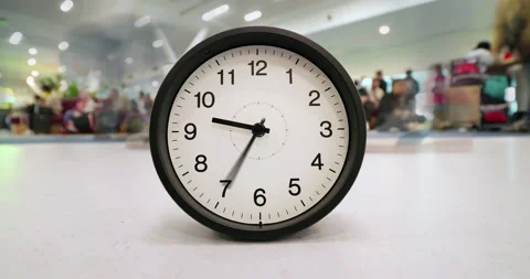 Time-lapse of clock with surreal spinning hands at airport gate Stock Footage 345716419