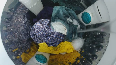 Time lapse close-up shot of washing with a washing machine Stock Footage 134557033
