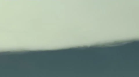 Time Lapse Close Up of Violent Mountain Wave Cloud with Jet Contrail Stock Footage 54743168