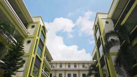 Time Lapse cloud between two buildings Stock Footage 154923369