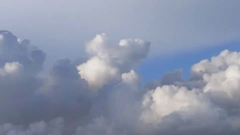 Time-lapse of cloud on a clear day before sunset Stock Footage 277280990