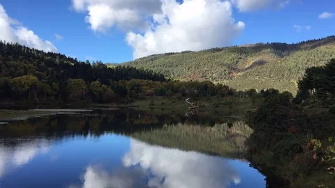 Time lapse cloud fly over the mountain and lake Stock Footage 82122523