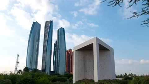 Time Lapse of cloud motion over Etihad building,  founder memorial in  Abu Dhabi Vídeos de archivo 257693209